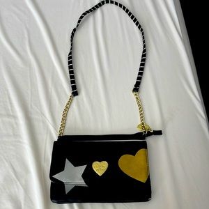 Black gold and silver shoulder Betsey Johnson bag.